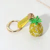 Fashnzfab Bling Studded Pineapple Keychain / Bag Charm In Yellow