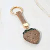Fashnzfab Bling Studded Strawberry Keychain / Bag Charm In Gold