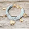 Fashnzfab Boho Heart Locket Bow Cross Charm Station Fabric Bracelet In Blue