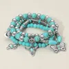 Fashnzfab Boho Western Steer Head Cowboy Hat Butterfly Totem Charm Beaded Stretch Multi Layered Bracelet Silve In Green
