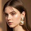 Fashnzfab Bold Oval Pearl Accent Hammered Frame Link Drop Statement Earing In Gold