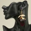 Fashnzfab Bold Oversized Resin Floral Petal Drop Statement Earrings - Purple In Gold