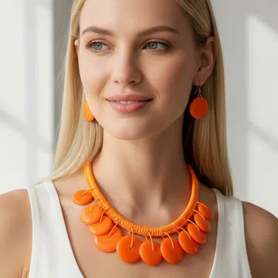 Fashnzfab Bold Resin Disc Embellished Statement Necklace In Orange
