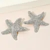 Fashnzfab Bold Rhinestone Paved Starfish Earrings In Metallic