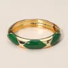 Fashnzfab Bold Statement Design Enamel Patterned Bangle Bracelet In Green