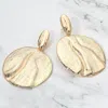 Fashnzfab Bold Textured Metal Disc Drop Clip On Earrings In Gold