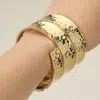 Fashnzfab Bold Wide Textured Metal Hinged Bangle Bracelet Gold In Gold