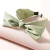 Fashnzfab Bow Pointed Headband In Green