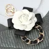 Fashnzfab Bow Rose Pointed Faux Leather Chain Link Keychain / Bag Charm In Multi