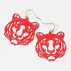 Fashnzfab Brass Metal Cutout Tiger Dangle Earrings In Red