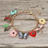 Fashnzfab Butterfly Dragonfly Heart Flower Leaves Charm Station Bracelet In Multi