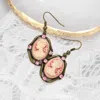 Fashnzfab Cameo Accented Stone Embellished Dangle Earrings - Pink In Brown