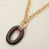 Fashnzfab Celluloid Acetate Oval Ring Pendant Chunky Chain Necklace In Brown