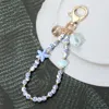 Fashnzfab Ceramic Starfish Seashell Floral Ball Beaded Keychain / Bag Charm In Multi