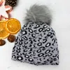 Fashnzfab Cheetah Print Double Layered Pom Pom Beanie Hat In Gray