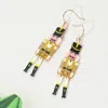 Fashnzfab Christmas Soldier Nutcracker Dangle Earrings In Gold