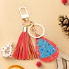 Fashnzfab Christmas Tree Print Faux Leather Teardrop Tassel Keychain / Bag Charm In Multi
