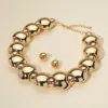 Fashnzfab Chunky Flattened Puffy Beaded Statement Necklace In Gold