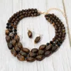Fashnzfab Chunky Resin Pebble Beaded Triple Layered Statement Necklace - Dark Brown, Gold In Brown