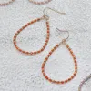 Fashnzfab Colored Cz Beaded Open Teardrop Dangle Earrings In Orange