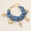 Fashnzfab Cross Heart Flower Charm Denim Fabric Braided Statement Bracelet Blue, Denim, Gold In Multi