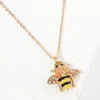 Fashnzfab Crystal Enamel Honey Bee Pendant Necklace In Gold