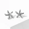 Fashnzfab Crystal Paved Starfish Stud Earrings In Metallic