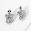 Fashnzfab Crystal Rhinestone Paved Turtle Stud Earrings In Metallic