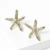 Fashnzfab Crystal Starfish Stud Earrings In Gold