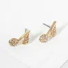 Fashnzfab Crystal Stone Paved Music Note Stud Earrings - Clear, Gold In Gold