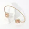 Fashnzfab Cz Quatrefoil Stone Tip Cuff Bracelet Champagne, Gold In Gold