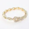 Fashnzfab Cz Stone Paved Buckle Accent Link Chain Hinged Bangle Bracelet Gold In Gold