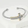 Fashnzfab Cz Stone Paved Cross Accent Two Tone Cuff Bracelet Two Tone In Multi