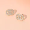 Fashnzfab Cz Stone Paved Double O Stud Earrings In Gold