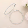 Fashnzfab Cz Stone Paved Hoop Earrings In Metallic