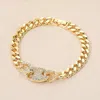 Fashnzfab Cz Stone Paved Mariner Link Charm Accent Cuban Link Chain Bracelet In Gold