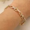 Fashnzfab Cz Stone Paved Modern Link Bracelet In Gold