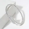 Fashnzfab Cz Stone Paved Nail Hinged Bangle Bracelet - Silver In Silver