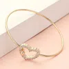 Fashnzfab Cz Stone Paved Open Heart Accented Bangle Bracelet Gold In Gold