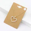 Fashnzfab Cz Stone Paved Open Heart Pendant Necklace In Silver
