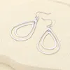 Fashnzfab Doble Open Metal Teardrop Dangle Earrings - Silver In Metallic