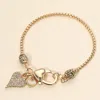 Fashnzfab Elegant Crystal Accent Heart Charm Bracelet - Gold In Gold