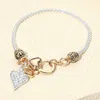 Fashnzfab Elegant Crystal Accent Heart Charm Bracelet In Multi