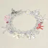 Fashnzfab Enamel Bow Pearl Stone Paved Heart Stone Bezel Charm Embellished Toggle Bracelet Multi, Silver In Multi