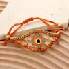 Fashnzfab Enamel Evil Eye Adjustable Pull Tie Cinch Bracelet Matte Gold, Orange In Multi