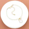 Fashnzfab Enamel Heart Charm Pendant Pearl Bracelet Gold, White In Multi