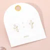Fashnzfab Enamel Mini Cross Stud Earrings - Gold, White In Gold
