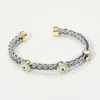 Fashnzfab Evil Eye Bezel Accent Two Tone Braided Cuff Bracelet In Brown