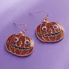 Fashnzfab Eye Pointed Glittered Enamel Halloween Pumpkin Dangle Earrings In Gold