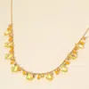 Fashnzfab Faceted Bead Charm Station Necklace In Yellow